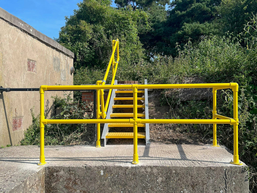 Yellow Key Clamps Outside Railing