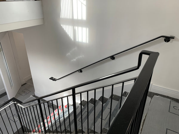 Black Plastic Handrail Fitting in Apartment Block in East Kilbride