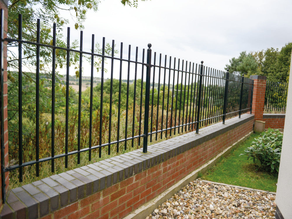 Black Flat bar fencing around housing estate