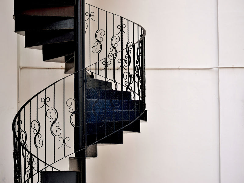 outdoor metal staircase with decorative metal stair spindles