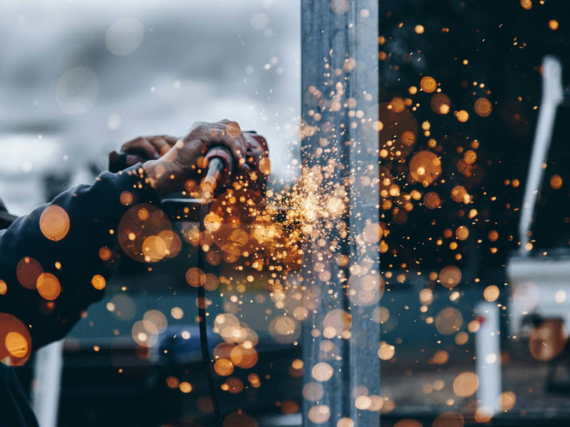 image of metal fabrication work being performed and sparks